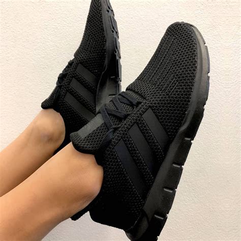 all black adidas sneakers women's.